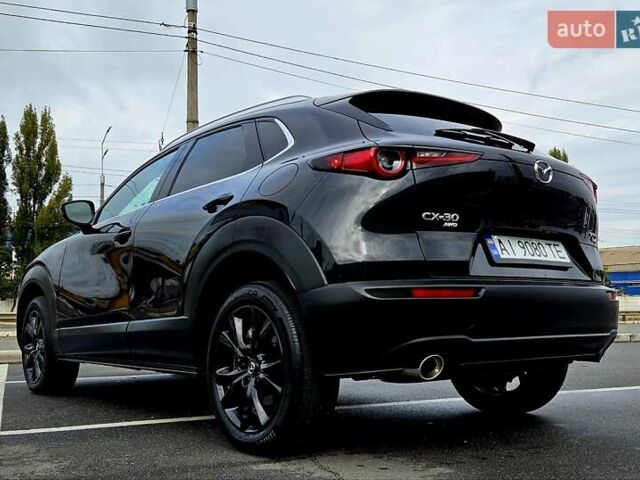 Чорний Мазда CX-30, об'ємом двигуна 2.49 л та пробігом 15 тис. км за 25299 $, фото 2 на Automoto.ua