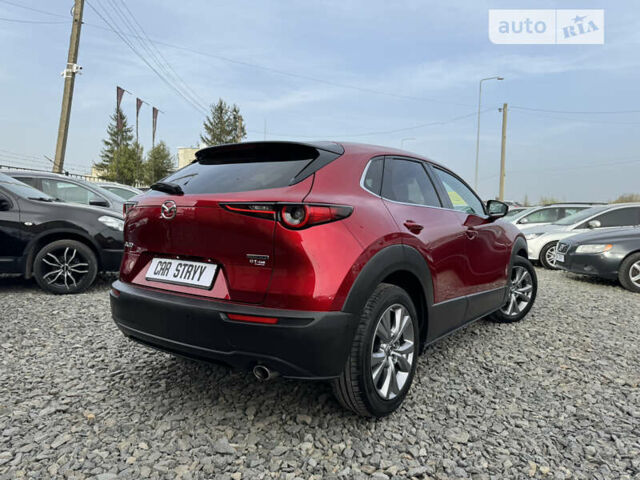 Красный Мазда CX-30, объемом двигателя 1.8 л и пробегом 162 тыс. км за 21900 $, фото 11 на Automoto.ua