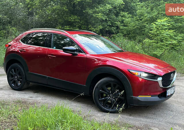 Красный Мазда CX-30, объемом двигателя 2.49 л и пробегом 104 тыс. км за 20999 $, фото 4 на Automoto.ua