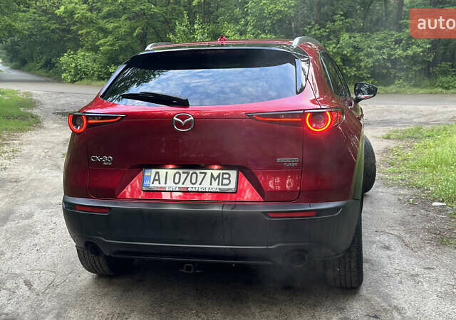 Красный Мазда CX-30, объемом двигателя 2.49 л и пробегом 104 тыс. км за 20999 $, фото 7 на Automoto.ua