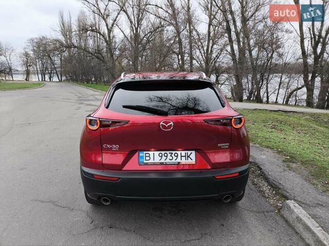 Красный Мазда CX-30, объемом двигателя 2.49 л и пробегом 64 тыс. км за 19800 $, фото 1 на Automoto.ua