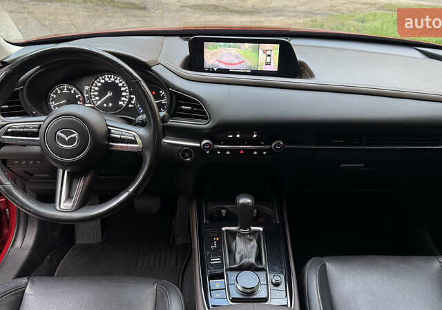 Красный Мазда CX-30, объемом двигателя 2.49 л и пробегом 104 тыс. км за 20999 $, фото 12 на Automoto.ua