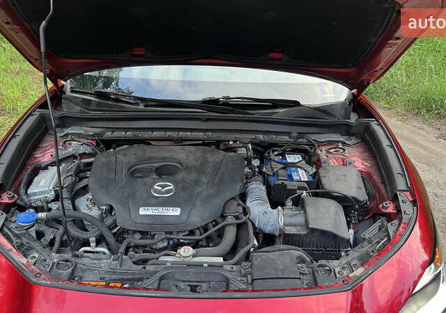 Красный Мазда CX-30, объемом двигателя 2.49 л и пробегом 104 тыс. км за 20999 $, фото 9 на Automoto.ua