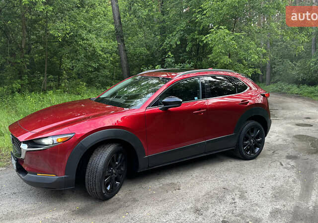 Красный Мазда CX-30, объемом двигателя 2.49 л и пробегом 104 тыс. км за 20999 $, фото 2 на Automoto.ua