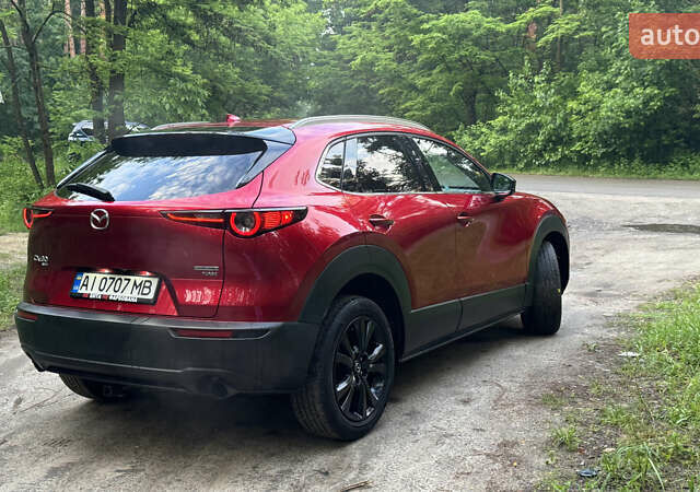 Красный Мазда CX-30, объемом двигателя 2.49 л и пробегом 104 тыс. км за 20999 $, фото 8 на Automoto.ua