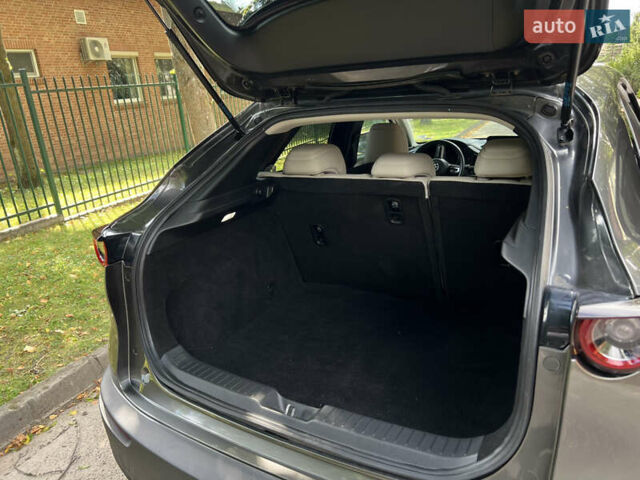 Серый Мазда CX-30, объемом двигателя 2.49 л и пробегом 48 тыс. км за 19200 $, фото 16 на Automoto.ua