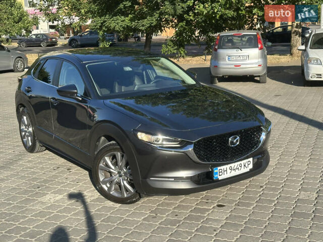 Серый Мазда CX-30, объемом двигателя 2 л и пробегом 43 тыс. км за 28300 $, фото 3 на Automoto.ua