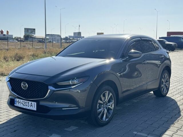 Серый Мазда CX-30, объемом двигателя 2.5 л и пробегом 79 тыс. км за 22500 $, фото 1 на Automoto.ua