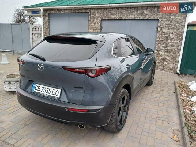 Серый Мазда CX-30, объемом двигателя 2 л и пробегом 105 тыс. км за 22500 $, фото 3 на Automoto.ua