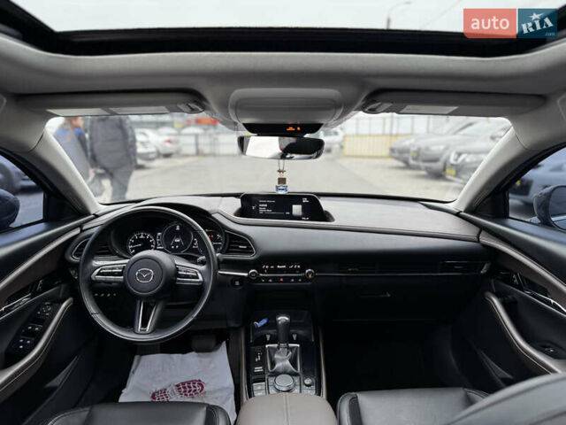 Серый Мазда CX-30, объемом двигателя 2.49 л и пробегом 52 тыс. км за 18000 $, фото 7 на Automoto.ua