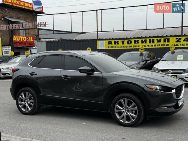 Серый Мазда CX-30, объемом двигателя 2.49 л и пробегом 52 тыс. км за 18000 $, фото 3 на Automoto.ua