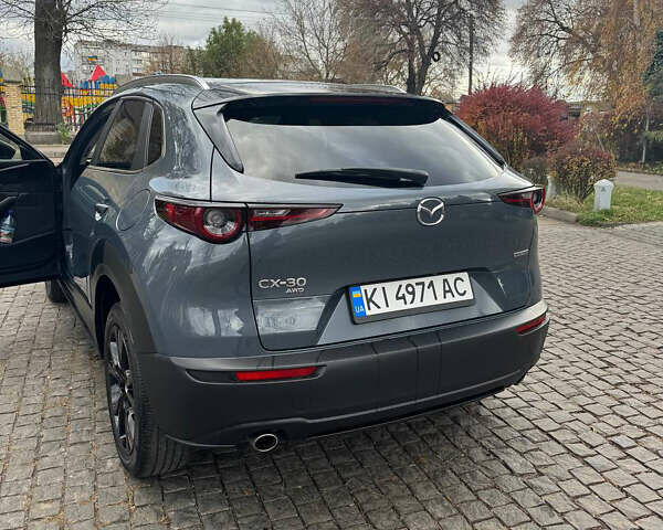 Серый Мазда CX-30, объемом двигателя 2.49 л и пробегом 94 тыс. км за 22000 $, фото 2 на Automoto.ua