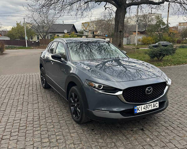 Серый Мазда CX-30, объемом двигателя 2.49 л и пробегом 94 тыс. км за 22000 $, фото 1 на Automoto.ua
