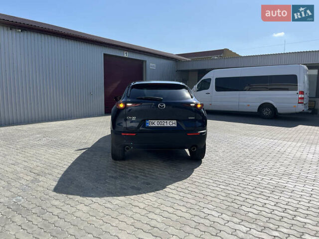 Синий Мазда CX-30, объемом двигателя 2.49 л и пробегом 133 тыс. км за 20000 $, фото 87 на Automoto.ua