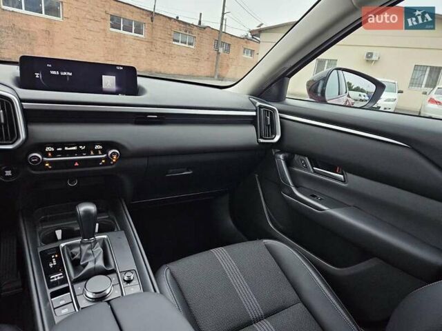 Червоний Мазда CX-50, об'ємом двигуна 2.49 л та пробігом 50 тис. км за 24999 $, фото 33 на Automoto.ua