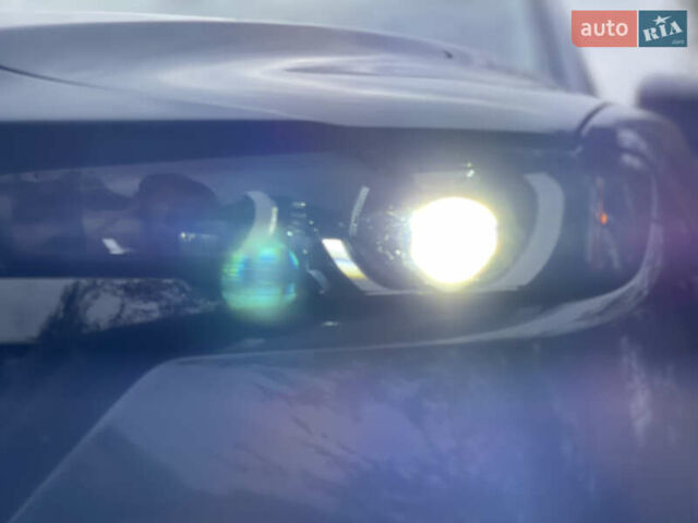 Синий Мазда CX-50, объемом двигателя 2.49 л и пробегом 49 тыс. км за 25600 $, фото 16 на Automoto.ua