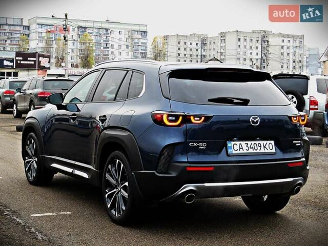 Синий Мазда CX-50, объемом двигателя 2.49 л и пробегом 49 тыс. км за 29950 $, фото 3 на Automoto.ua