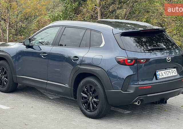 Мазда CX-50 2023 у Києві на Automoto.ua Синій Мазда CX-50, об'ємом двигуна 2.49 л та пробігом 49 тис. км за 26450 $, фото 3 на Automoto.ua