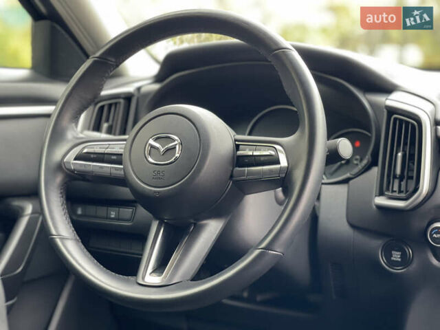 Синий Мазда CX-50, объемом двигателя 2.49 л и пробегом 49 тыс. км за 25600 $, фото 11 на Automoto.ua