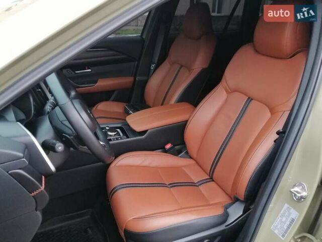 Зелений Мазда CX-50, об'ємом двигуна 2.49 л та пробігом 13 тис. км за 35000 $, фото 21 на Automoto.ua