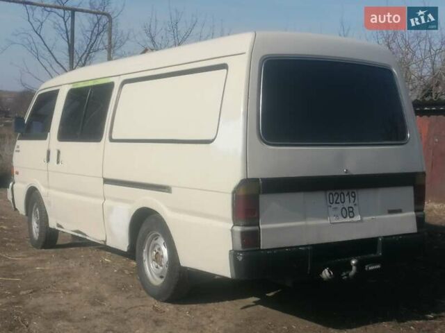 Белый Мазда E-series, объемом двигателя 2 л и пробегом 300 тыс. км за 1510 $, фото 4 на Automoto.ua