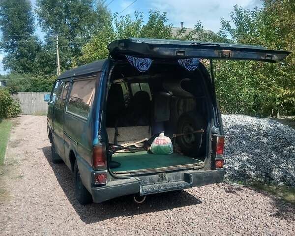 Синий Мазда E-series, объемом двигателя 2.2 л и пробегом 300 тыс. км за 1799 $, фото 11 на Automoto.ua