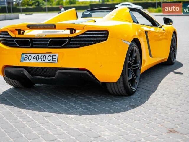 Желтый МакЛарен МП4, объемом двигателя 3.8 л и пробегом 26 тыс. км за 150000 $, фото 6 на Automoto.ua
