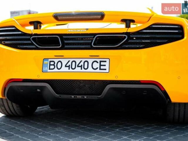 Желтый МакЛарен МП4, объемом двигателя 3.8 л и пробегом 26 тыс. км за 150000 $, фото 5 на Automoto.ua