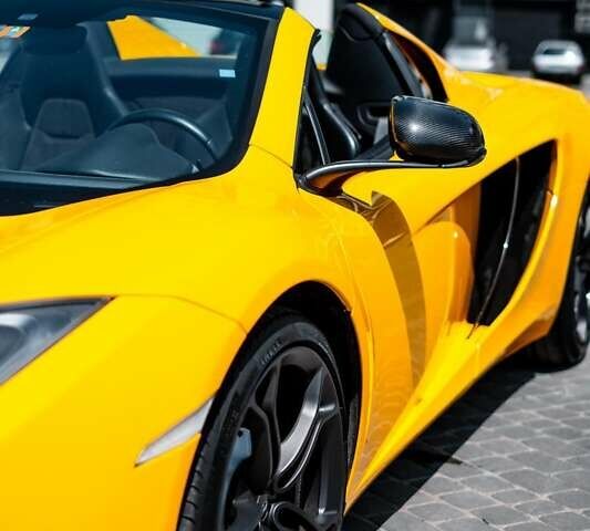 Желтый МакЛарен МП4, объемом двигателя 3.8 л и пробегом 26 тыс. км за 150000 $, фото 7 на Automoto.ua