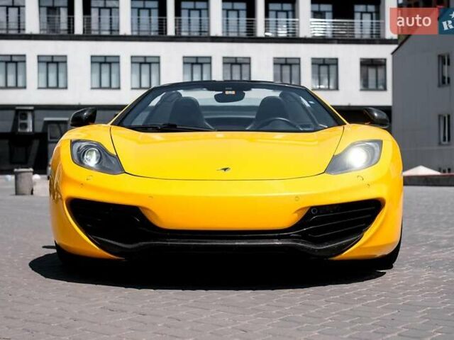 Желтый МакЛарен МП4, объемом двигателя 3.8 л и пробегом 26 тыс. км за 150000 $, фото 1 на Automoto.ua