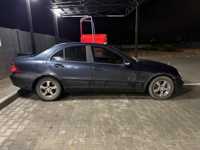 Черный Мерседес 190, объемом двигателя 2 л и пробегом 160 тыс. км за 2100 $, фото 1 на Automoto.ua