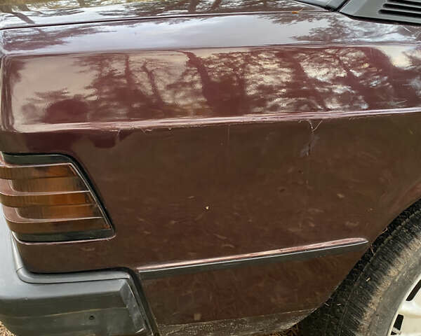 Красный Мерседес 190, объемом двигателя 2 л и пробегом 299 тыс. км за 2700 $, фото 5 на Automoto.ua