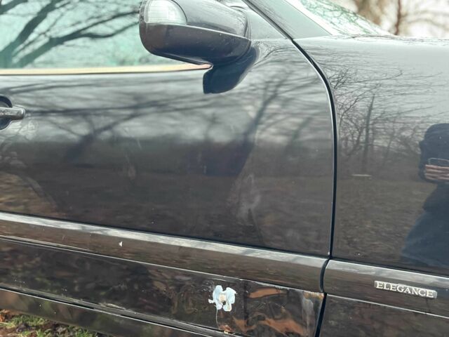 Чорний Мерседес 200, об'ємом двигуна 2 л та пробігом 3 тис. км за 2300 $, фото 4 на Automoto.ua