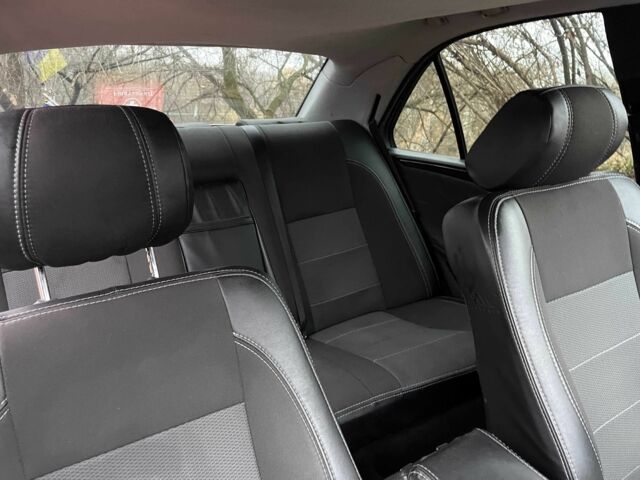 Чорний Мерседес 200, об'ємом двигуна 2 л та пробігом 3 тис. км за 2300 $, фото 14 на Automoto.ua