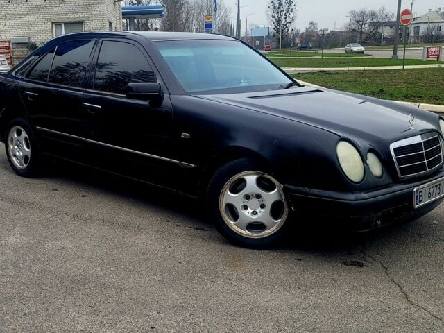 Черный Мерседес 200, объемом двигателя 2 л и пробегом 400 тыс. км за 2499 $, фото 2 на Automoto.ua