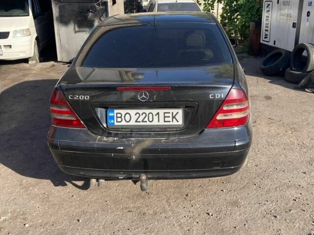 Черный Мерседес 200, объемом двигателя 2.2 л и пробегом 250 тыс. км за 3800 $, фото 1 на Automoto.ua