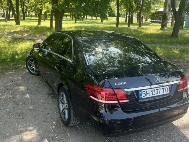 Черный Мерседес 200, объемом двигателя 2 л и пробегом 400 тыс. км за 11300 $, фото 3 на Automoto.ua