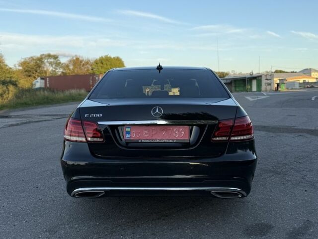 Черный Мерседес 200, объемом двигателя 2 л и пробегом 195 тыс. км за 13200 $, фото 1 на Automoto.ua