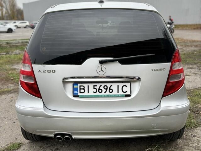 Серый Мерседес 200, объемом двигателя 2 л и пробегом 245 тыс. км за 5900 $, фото 2 на Automoto.ua