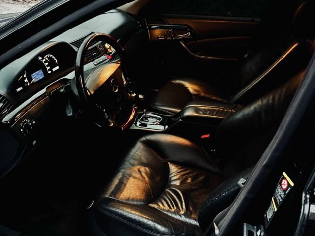 Чорний Мерседес 220, об'ємом двигуна 5 л та пробігом 268 тис. км за 9511 $, фото 4 на Automoto.ua