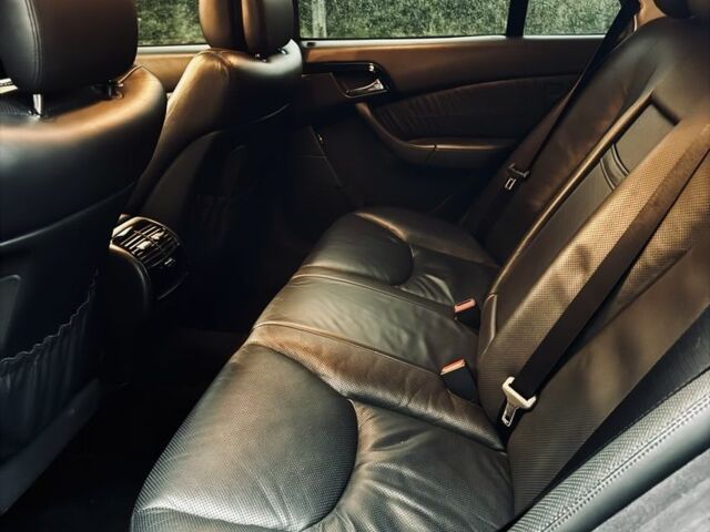 Чорний Мерседес 220, об'ємом двигуна 5 л та пробігом 268 тис. км за 9511 $, фото 7 на Automoto.ua