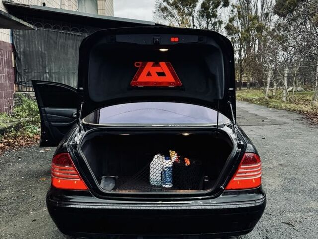 Чорний Мерседес 220, об'ємом двигуна 5 л та пробігом 268 тис. км за 9511 $, фото 6 на Automoto.ua