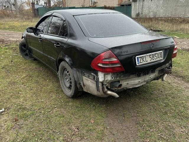 Черный Мерседес 320, объемом двигателя 3.2 л и пробегом 231 тыс. км за 2200 $, фото 3 на Automoto.ua