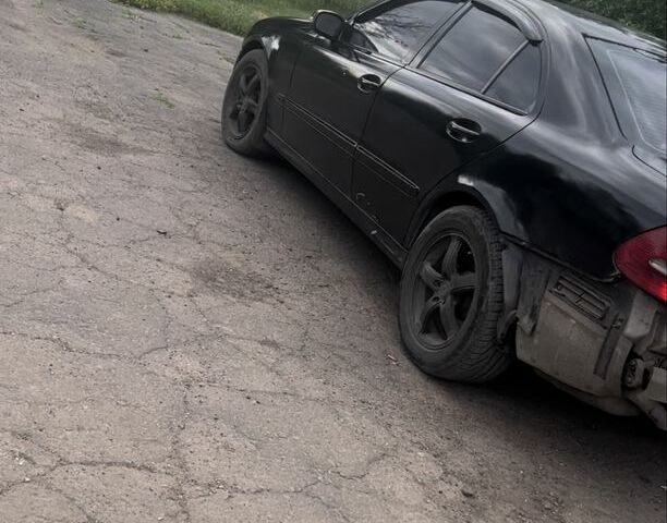 Черный Мерседес 320, объемом двигателя 3.2 л и пробегом 350 тыс. км за 2383 $, фото 2 на Automoto.ua