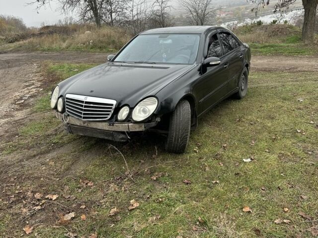 Черный Мерседес 320, объемом двигателя 3.2 л и пробегом 231 тыс. км за 2200 $, фото 1 на Automoto.ua