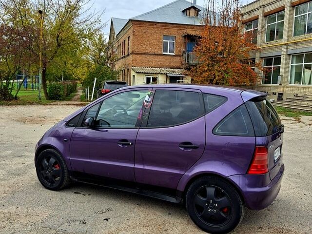 Фиолетовый Мерседес А класс, объемом двигателя 1.9 л и пробегом 316 тыс. км за 2400 $, фото 7 на Automoto.ua