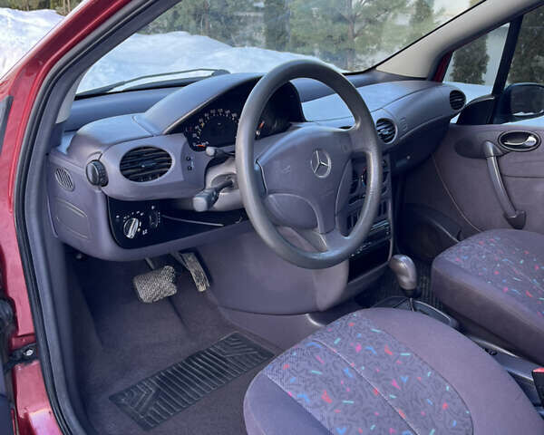 Красный Мерседес А класс, объемом двигателя 1.6 л и пробегом 248 тыс. км за 4300 $, фото 28 на Automoto.ua