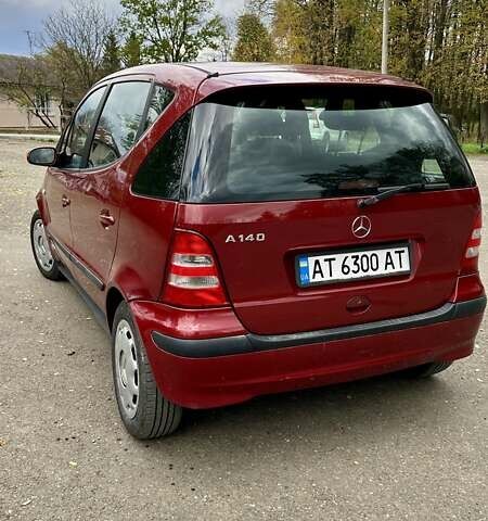 Красный Мерседес А класс, объемом двигателя 1.4 л и пробегом 220 тыс. км за 3800 $, фото 1 на Automoto.ua