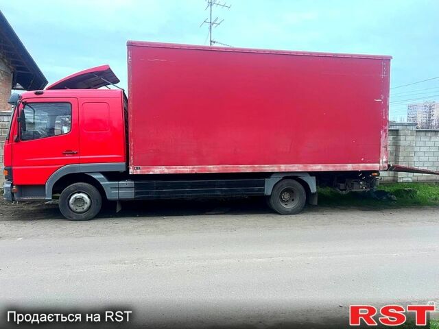 Красный Мерседес Атего, объемом двигателя 4.2 л и пробегом 500 тыс. км за 13000 $, фото 1 на Automoto.ua