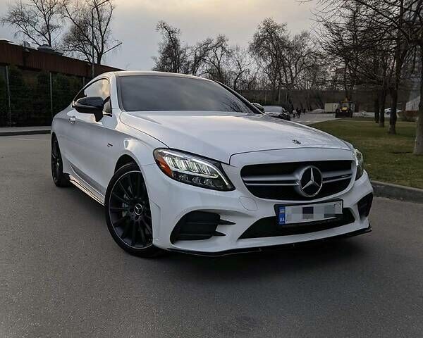 Білий Мерседес C 43 AMG, об'ємом двигуна 3 л та пробігом 10 тис. км за 45000 $, фото 1 на Automoto.ua